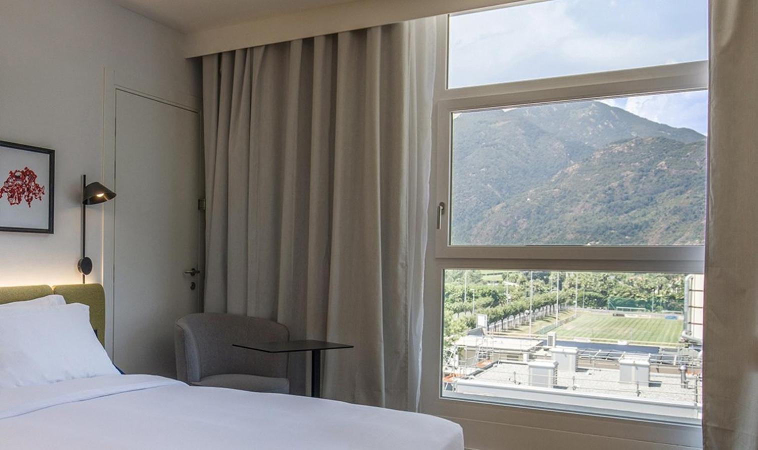Hotel Hampton By Hilton Locarno Losone Esterno foto